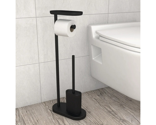 Set de toaletă stativ cu suport hârtie igienică, raft și perie de toaletă într-o baie luminoasă și modernă lângă vasul de toaletă.