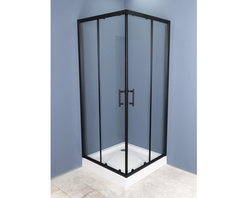 Cabină de duș pe colț cu profile negre, uși din sticlă transparentă, mânere negre și cădiță de duș albă.