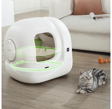 Litieră inteligentă automatizată pentru pisici PETKIT Pura Max într-o cameră de zi luminoasă cu o pisică pe podeaua de lemn.