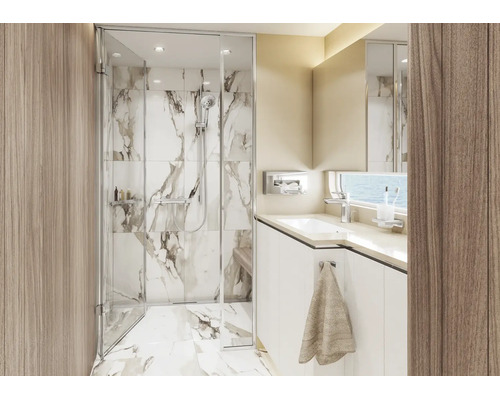 Baie modernă cu cabină de duș din sticlă, plăci cu aspect de marmură și mască de chiuvetă albă. Design luminos și organizat.