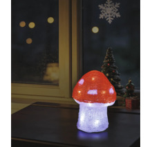 Ciupercă decorativă LED iluminată din acril pe o masă, decorațiune de Crăciun la fereastră în fundal.
