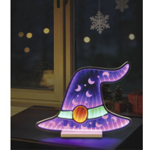 Decorațiune LED pălărie de vrăjitoare cu efect de oglindă infinită, stele și luni pe o masă în fața unei ferestre.