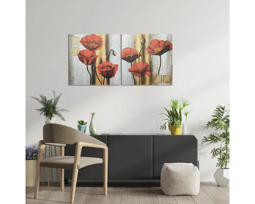 Tablou pe pânză din două piese cu maci roșii deasupra unei comode închise la culoare într-o cameră luminoasă, modernă, cu plante de apartament.