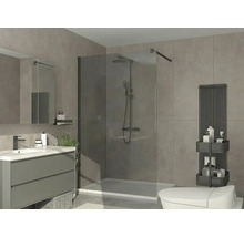 Baie modernă cu duș de tip walk-in din sticlă, dulap de lavoar gri cu chiuvetă albă, radiator negru și gresie gri.
