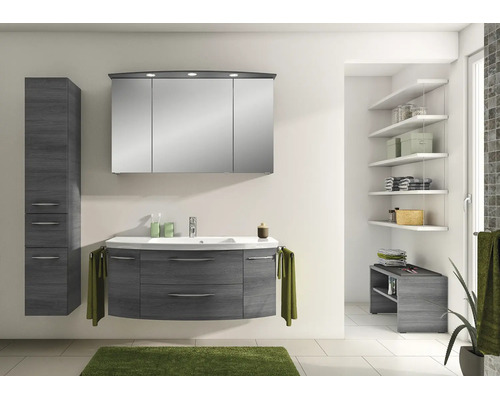 Set mobilier modern de baie cu aspect de lemn închis, dulap sub chiuvetă, lavoar ceramic alb, dulap cu oglindă și iluminare și dulap înalt.