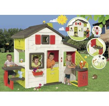 Căsuță de joacă cu copii în grădină