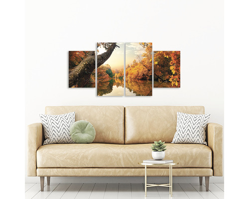 Tablou de perete din patru piese cu peisaj de toamnă deasupra canapelei
