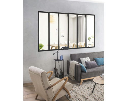 Living cu oglindă în design industrial, canapea și fotoliu