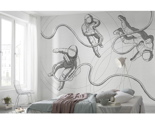 Dormitor cu fototapet cu motiv de astronauți pe perete