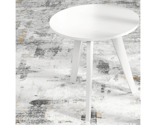 Măsuță laterală rotundă albă cu trei picioare pe un covor