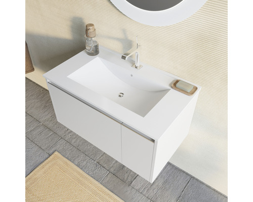 Chiuvetă cu dulap, armătură, dozator de săpun și săpun de mâini în baie