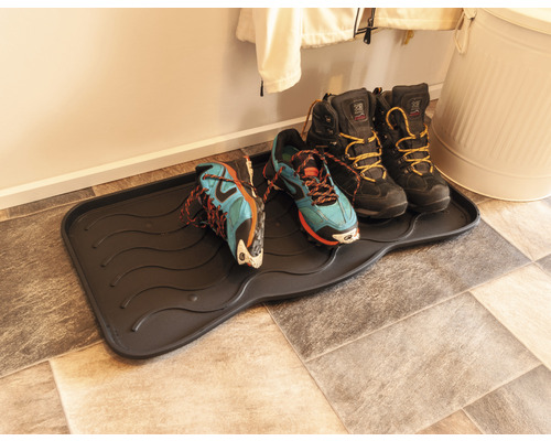 Suport pentru pantofi cu pantofi în hol