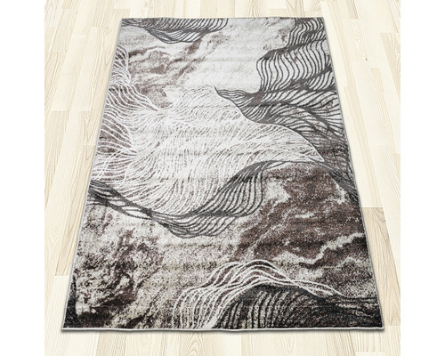 Covor decorativ cu model abstract pentru interior.