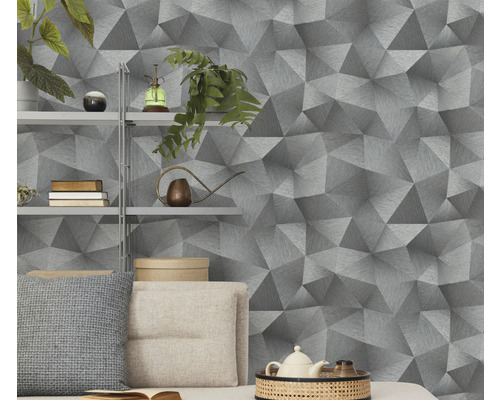 Cameră de zi cu tapet geometric cu aspect tridimensional, raft și decorațiuni