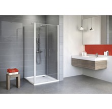 Cabină de duș în baie modernă cu dulap de lavoar și prosoape