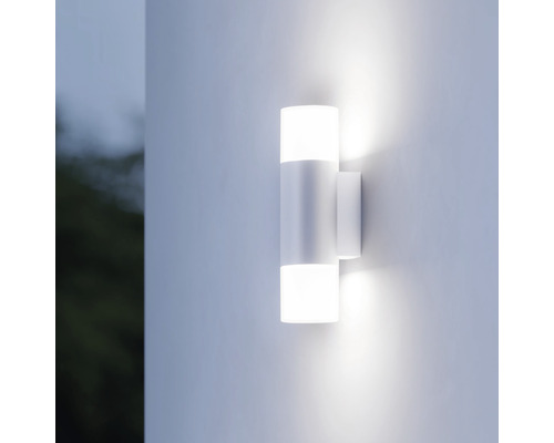 Lumină de perete cu LED alb pentru exterior, cu design cilindric, pe un perete