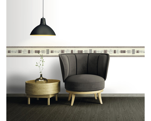 Scenă cu fotoliu, masă, lampă suspendată și bordură