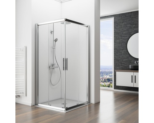 Cabină de duș pe colț cu baterie de duș și duș de mână într-o baie mobilată modern.