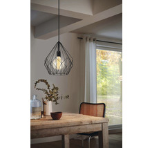 Sufragerie cu masă din lemn și lampă suspendată neagră cu design din sârmă