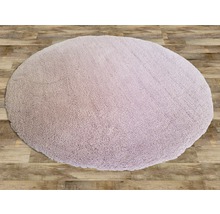 Covor rotund, tufted, pe podea de lemn