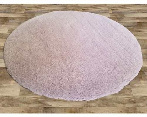 Covor rotund, tufted, pe podea de lemn