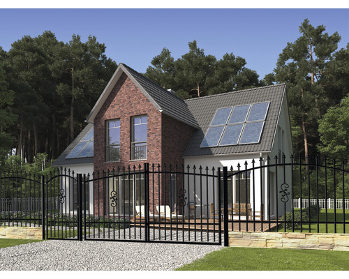 Casă cu gard metalic și poartă de grădină