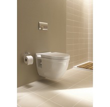 Toaletă suspendată cu panou de control într-o baie cu gresie