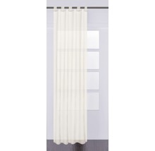 Cortină cu suspensie cu buclă în fața unei ferestre