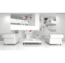 Cameră luminoasă cu două canapele albe, o masă și fototapet cu forme geometrice și păsări origami.