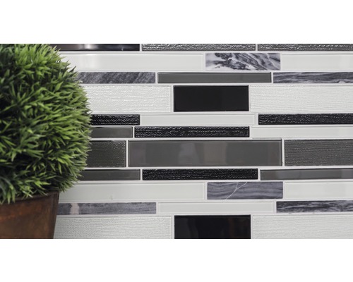 Placă de perete cu model mozaic și plantă