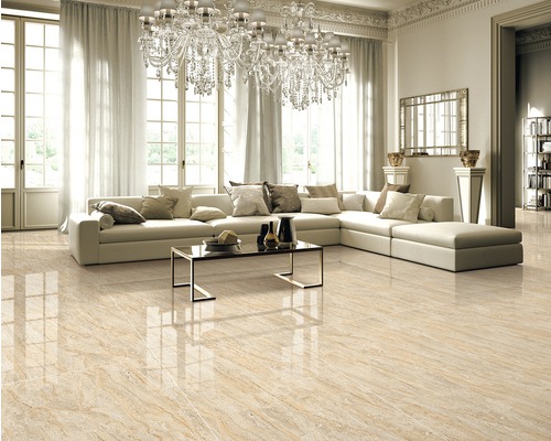 Living luminos cu canapea, masă și pardoseală cu aspect de marmură.