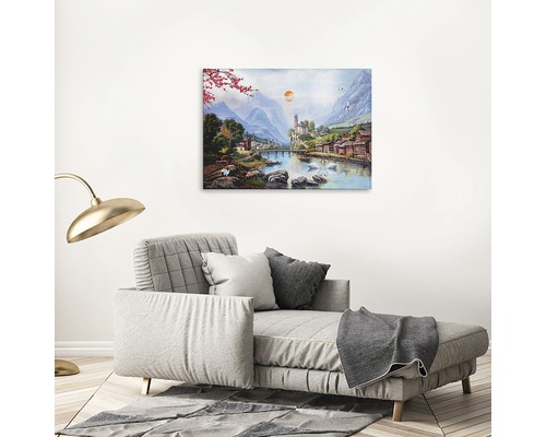 Tablou canvas cu peisaj montan deasupra canapelei