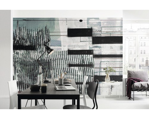 Birou modern cu pictură murală abstractă, birou și scaun.