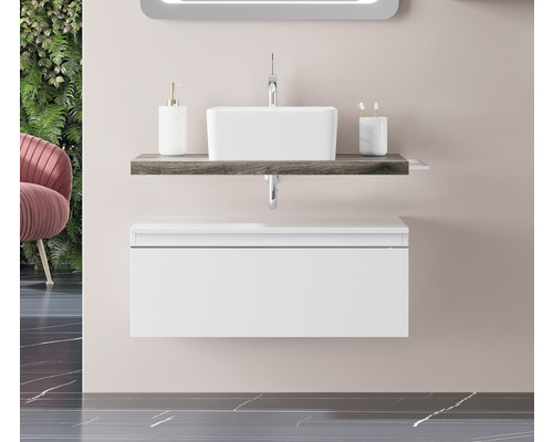 Combinație de lavoar cu chiuvetă, blat de lavoar și dulap inferior în baie.