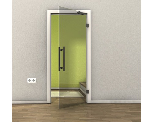 Ușă de sticlă deschisă cu mâner și toc într-o cameră