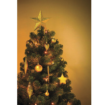 Brad împodobit cu stea în vârf și globuri de Crăciun