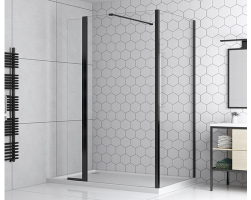 Cabină de duș cu cadru negru în baie.