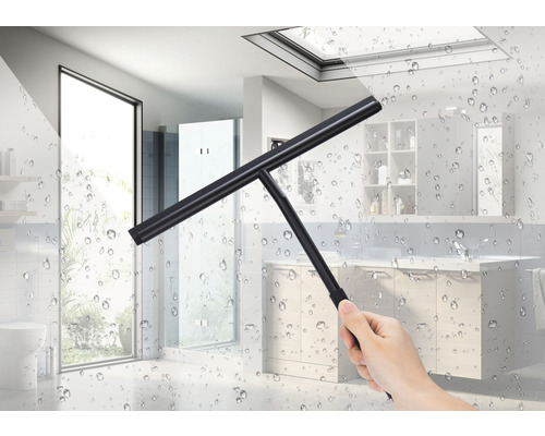 Racletă pentru geamuri în fața plăcilor de baie cu picături de apă