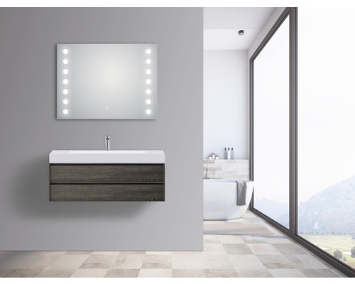 Baie modernă cu dulap de bază pentru lavoar, lavoar și oglindă iluminată