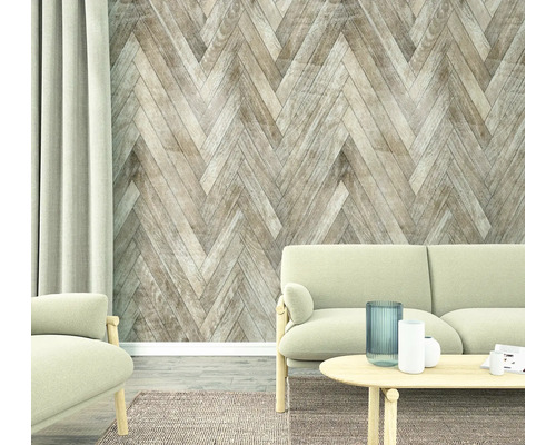 Living cu canapea, masă și perete cu model herringbone