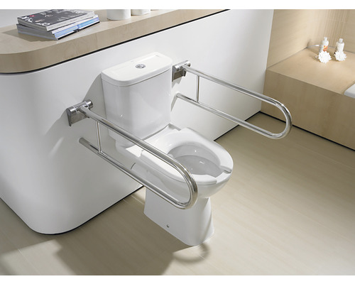 Toaletă cu bare de sprijin în baie