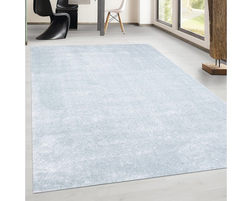 Covor deschis la culoare în zona de living