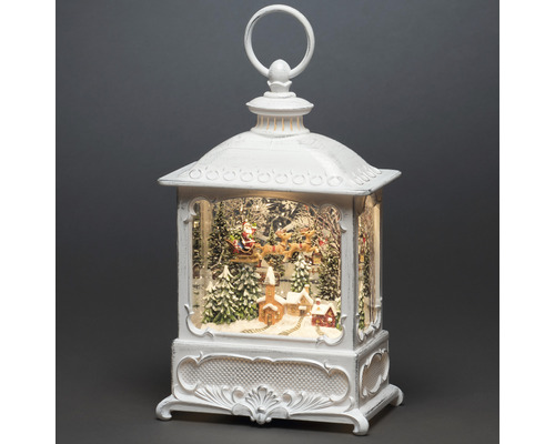 Lanternă decorativă de Crăciun cu Moș Crăciun în sanie și peisaj de iarnă