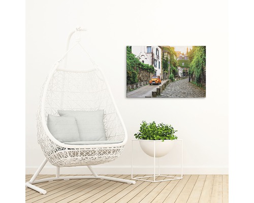 Tablou decorativ de perete cu o scenă stradală și o mașină