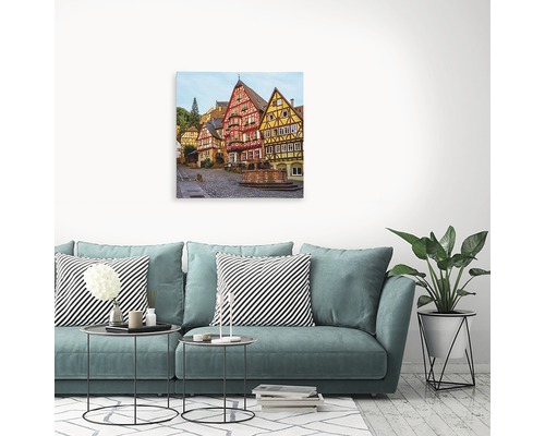 Tablou de perete cu case cu structură din lemn într-un oraș
