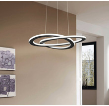 Lumină suspendată LED modernă cu design circular în camera de zi.