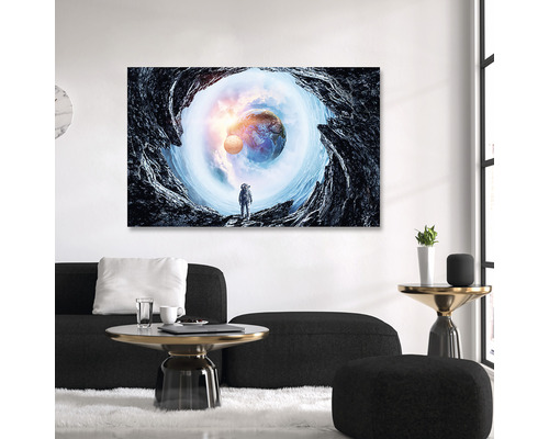Tablou canvas cu motiv astronaut și planete în camera de zi