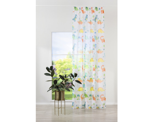 Șaluri decorative cu model de dinozaur în fața unei ferestre