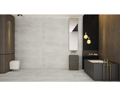 Baie modernă cu cadă, chiuvetă, toaletă și faianță