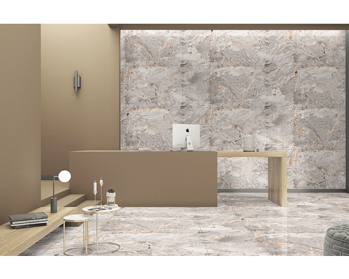 Interior modern cu gresie de podea și faianță cu aspect de marmură, birou și elemente decorative.